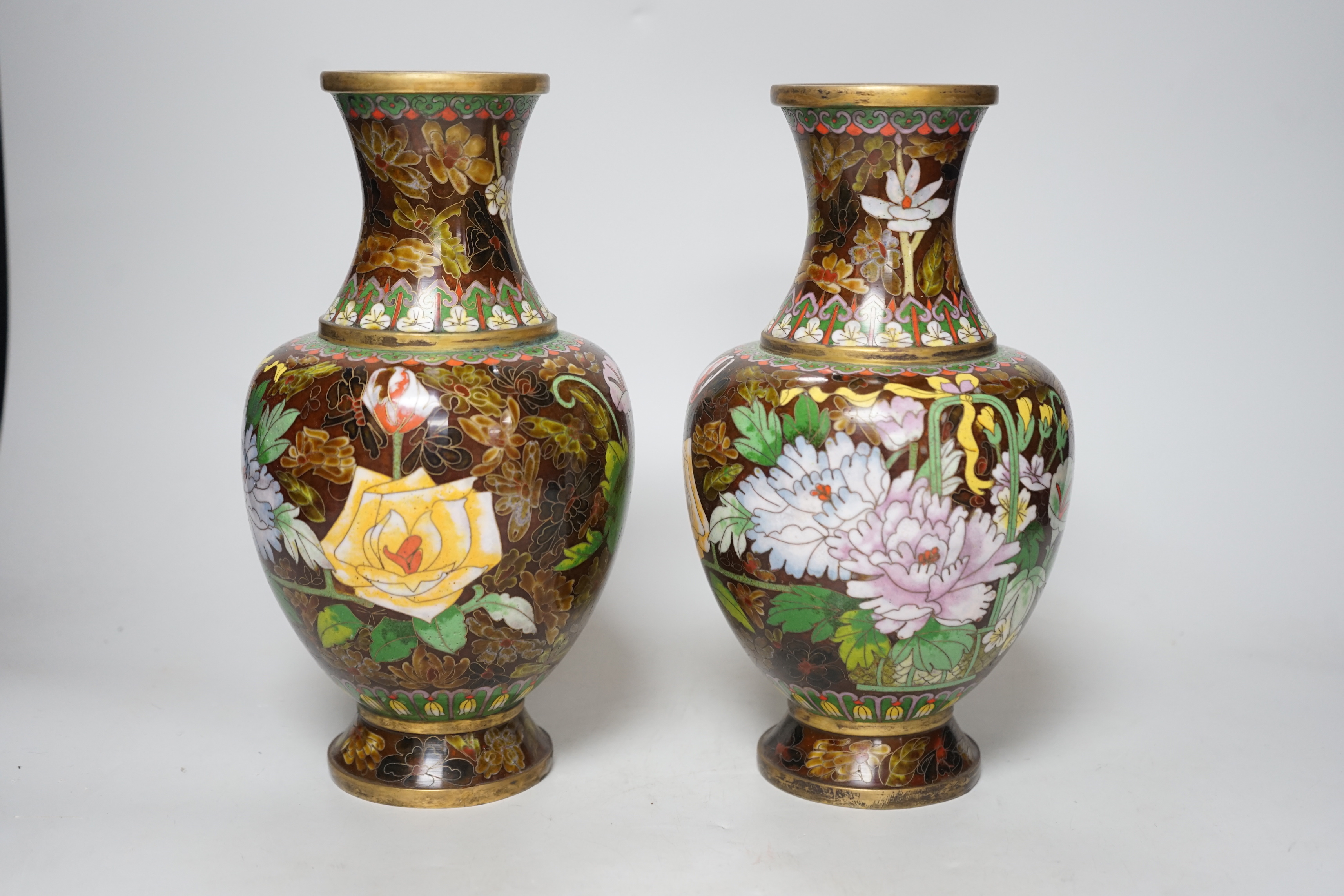 A pair of Chinese cloisonné enamel vases, 26cm